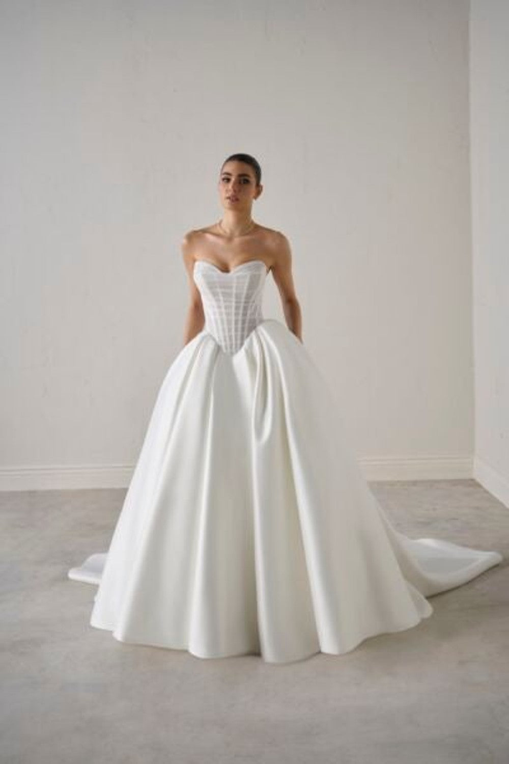 Sculpted Romance in Pleated Bridal Design