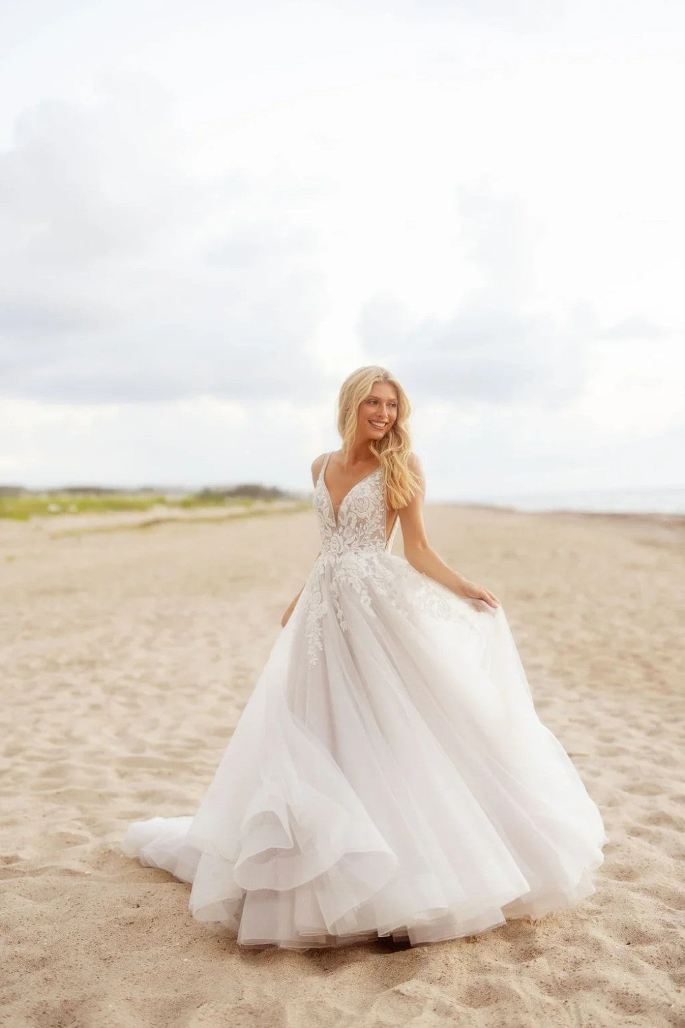 The Allure of Deep V Necklines in Bridal Design
