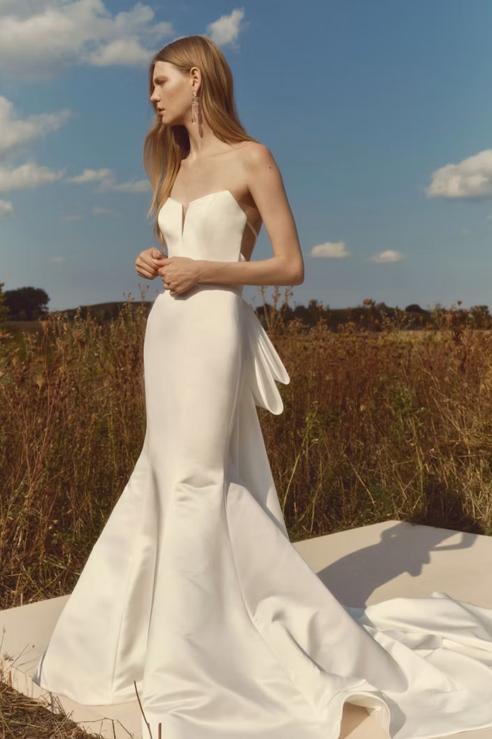 Clean and Simple Fit-And-Flare Wedding Dress with Oversized Bow by Alyne by Rita Vinieris — image 1 of 3