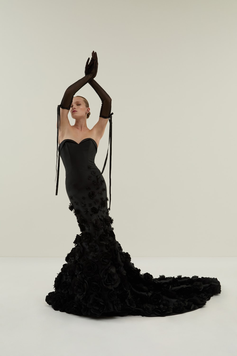 Elegant Black Fit-And-Flare Gown with Floral Details by Demetrios — image 1 of 2