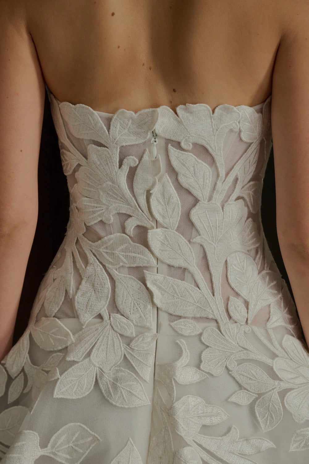 Elegant Strapless Ball Gown with Embroidered Floral Motifs by Enaura Bridal — image 4 of 4