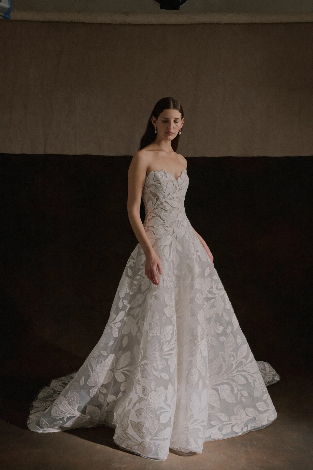 Elegant Strapless Ball Gown with Embroidered Floral Motifs by Enaura Bridal — image 3 of 4