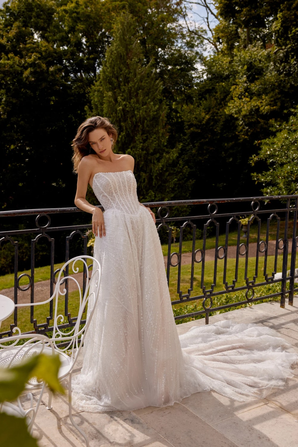 Sparkly and Beaded Strapless Ball Gown by Justin Alexander — image 1 of 5