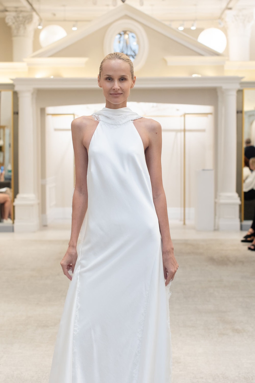 Chic and Sexy High Neck Sheath Wedding Dress with Dramatic Open Back by Martina Liana for Kleinfeld — image 2 of 3