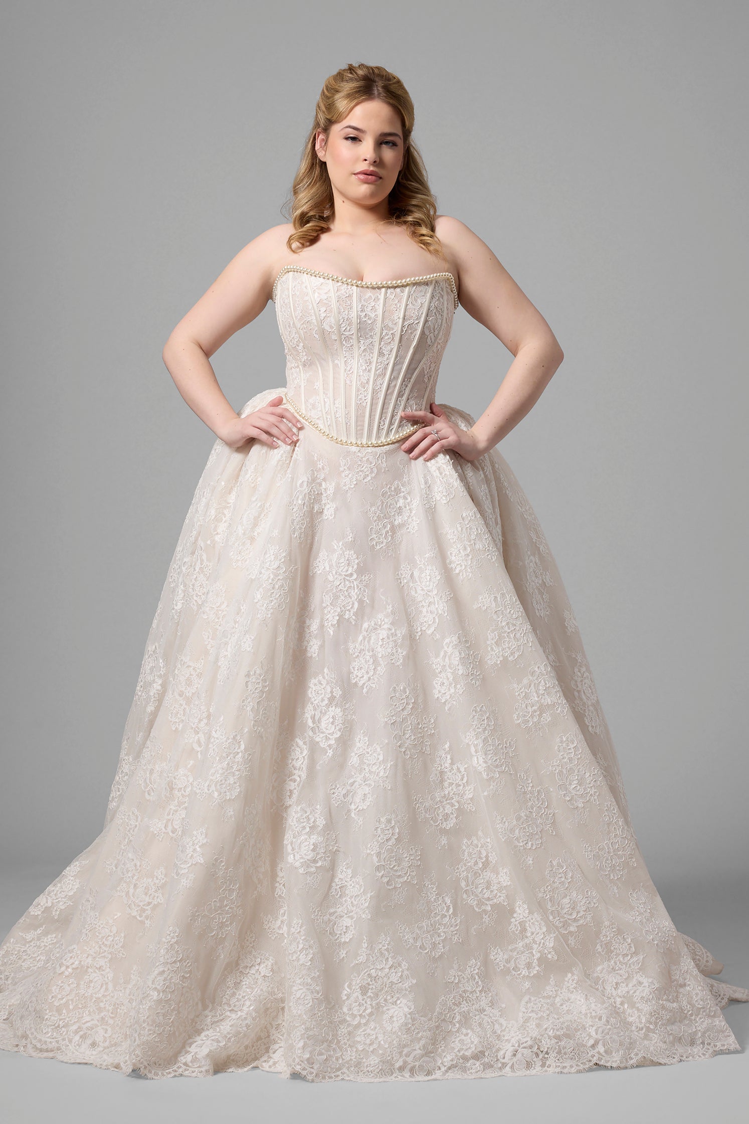 Plus-Size Strapless Lace Ball Gown With Pearls And Bow