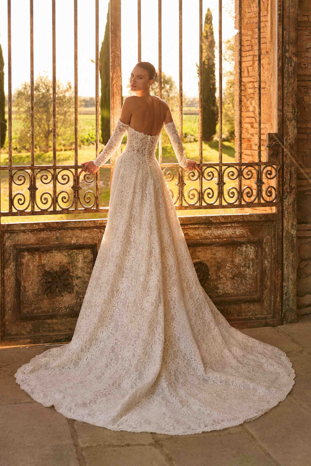 Sweet and Strapless Lace A-Line Wedding Dress with Detachable Sleeves by Pronovias — image 2 of 2