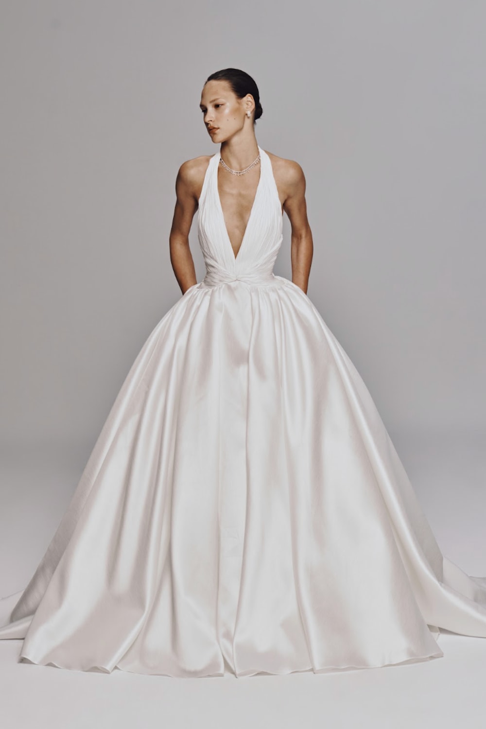 Chic and Modern Halter Neck Ball Gown by Nicole + Felicia For Kleinfeld — image 1 of 3