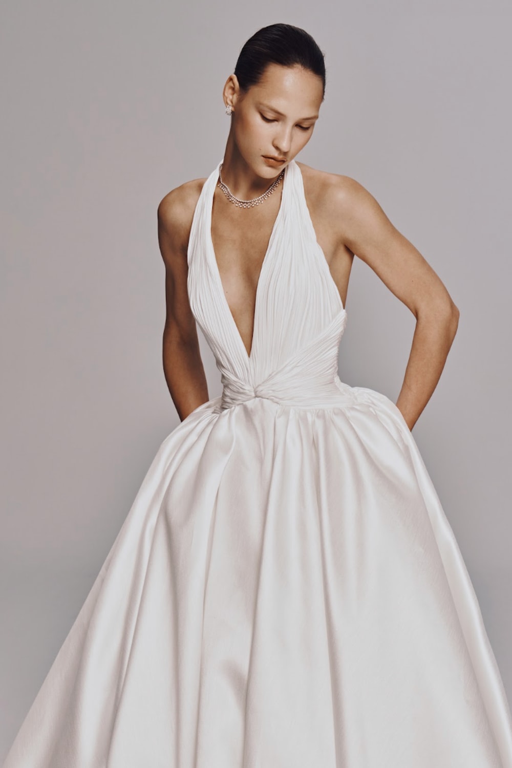 Chic and Modern Halter Neck Ball Gown by Nicole + Felicia For Kleinfeld — image 2 of 3