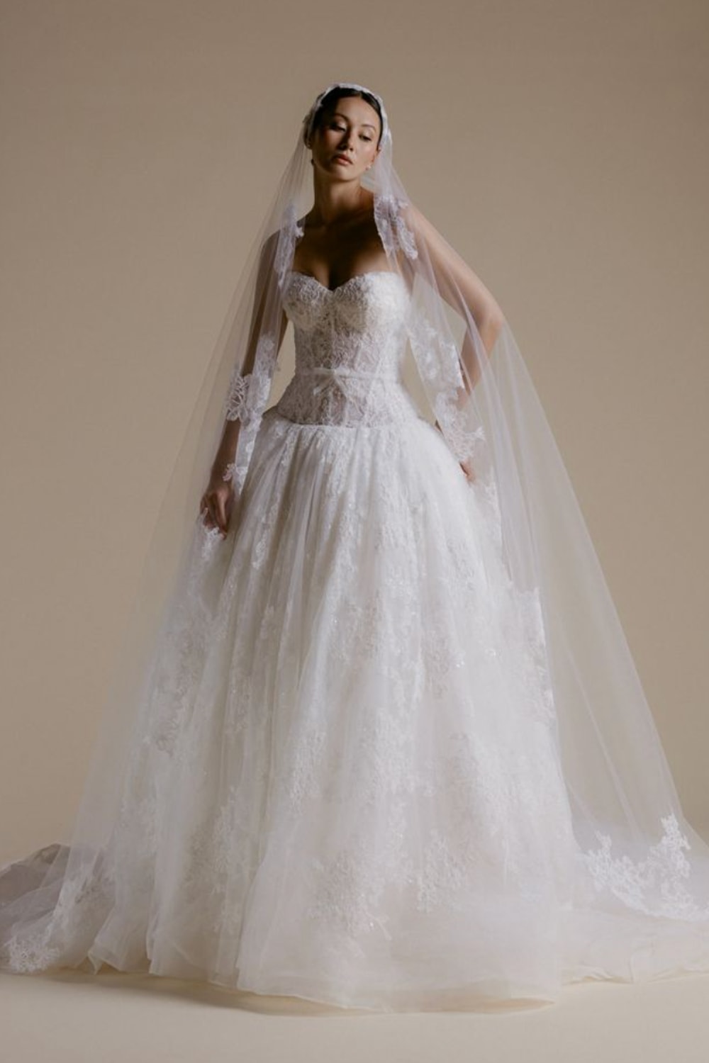 Elegant Drop Waist Ball Gown with Bow Detail by Viola Chan for Kleinfeld — image 1 of 4