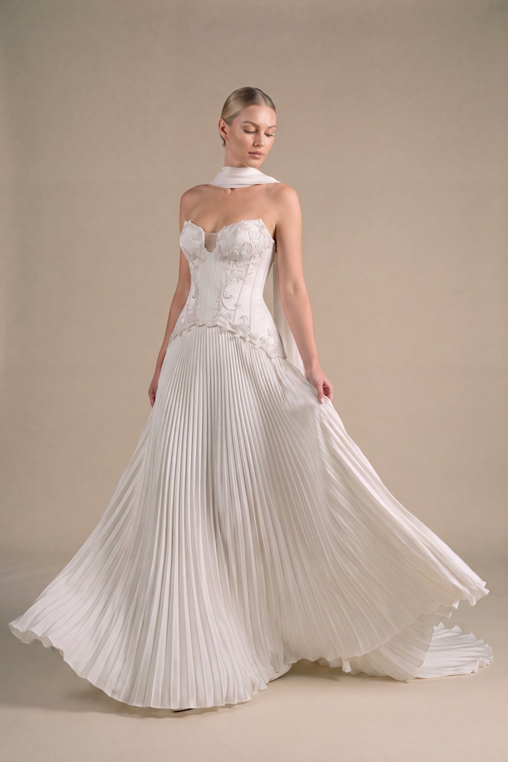 Modern Structured A-Line Wedding Dress with Pleated Skirt by Kleinfeld By Viola Chan — image 2 of 4