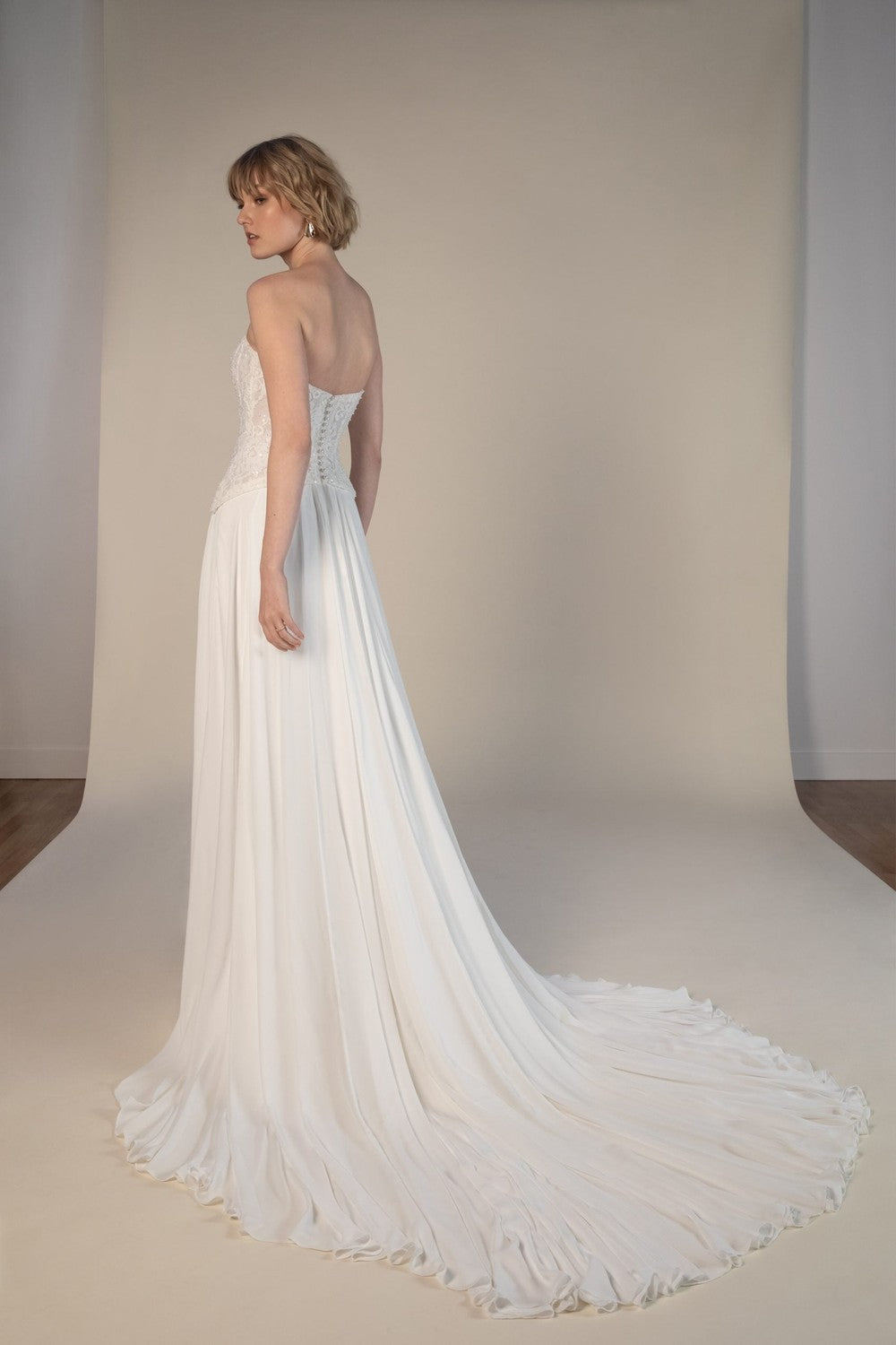 Chic And Romantic Embellished Lace Sheath Wedding Dress With Detachable Puff Sleeves by All Who Wander — image 2 of 2