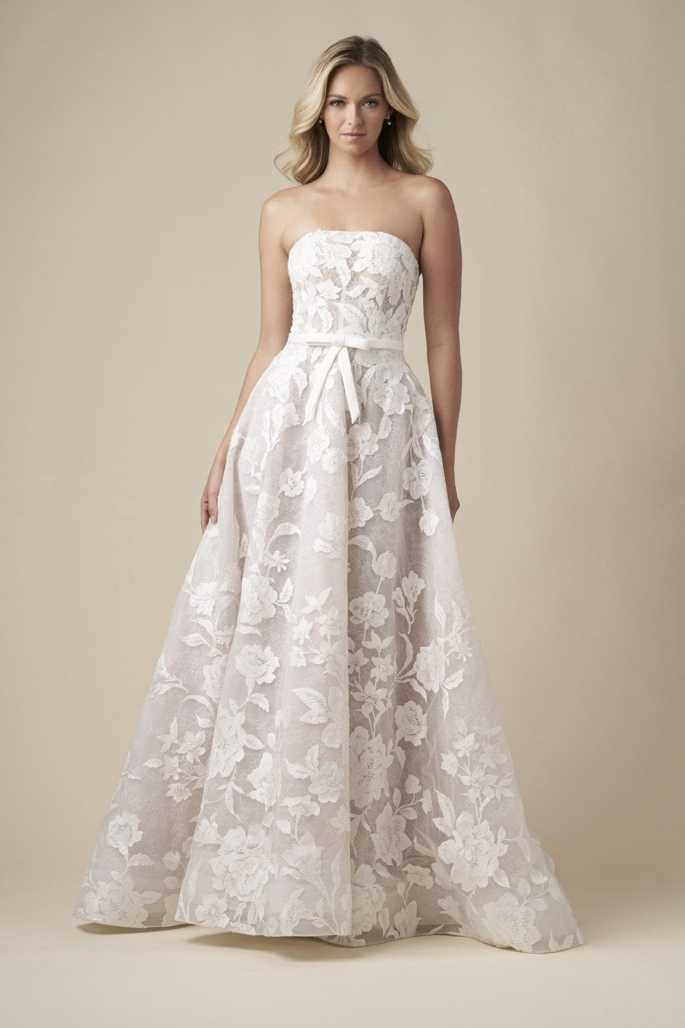 Romantic Floral Lace A-Line Wedding Dress With Bow by Danielle Caprese — image 1 of 4