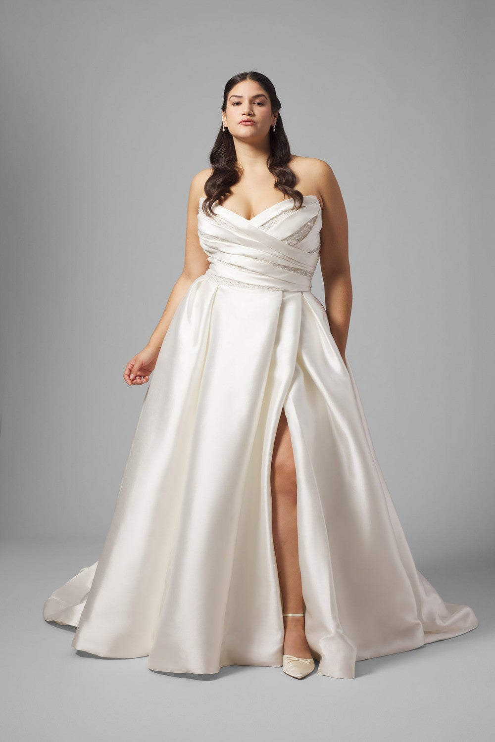 Plus-Size Dramatic Silk Ball Gown With Slit And Puff Sleeves by Demetrios — image 1 of 3