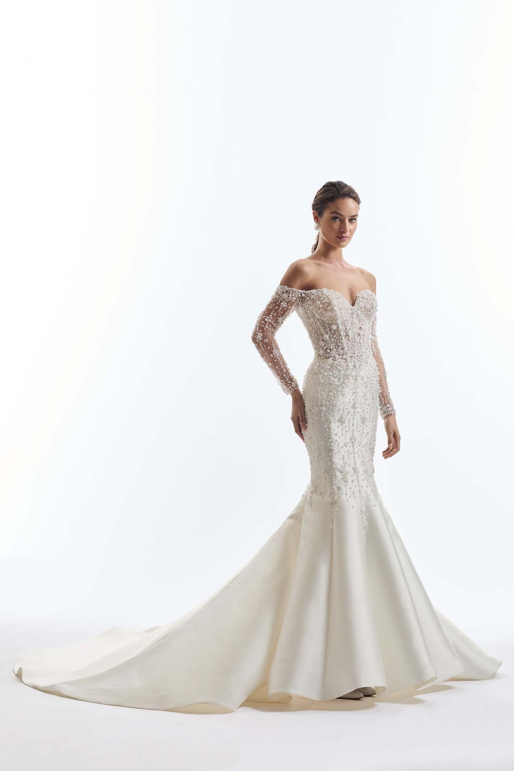 Off-The-Shoulder Long Sleeve Fit-And-Flare Wedding Dress by Demetrios — image 1 of 2
