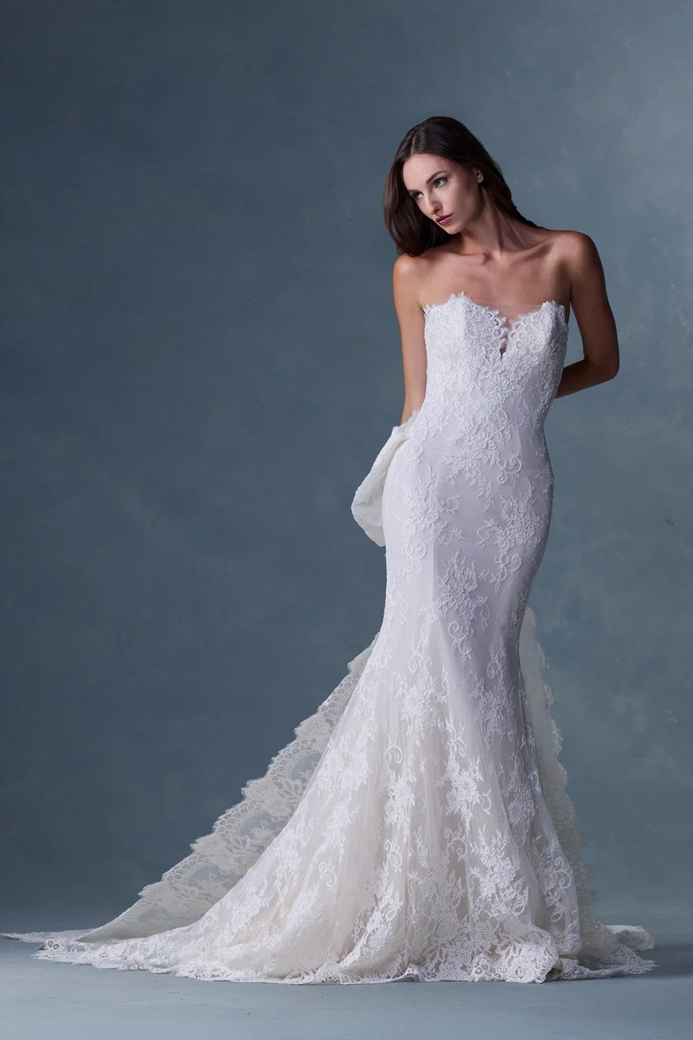 Lace Strapless Fit-and-Flare Gown With Bow Detail | Kleinfeld Bridal Lace Strapless Fit-and-Flare Gown With Bow Detail | Kleinfeld Bridal