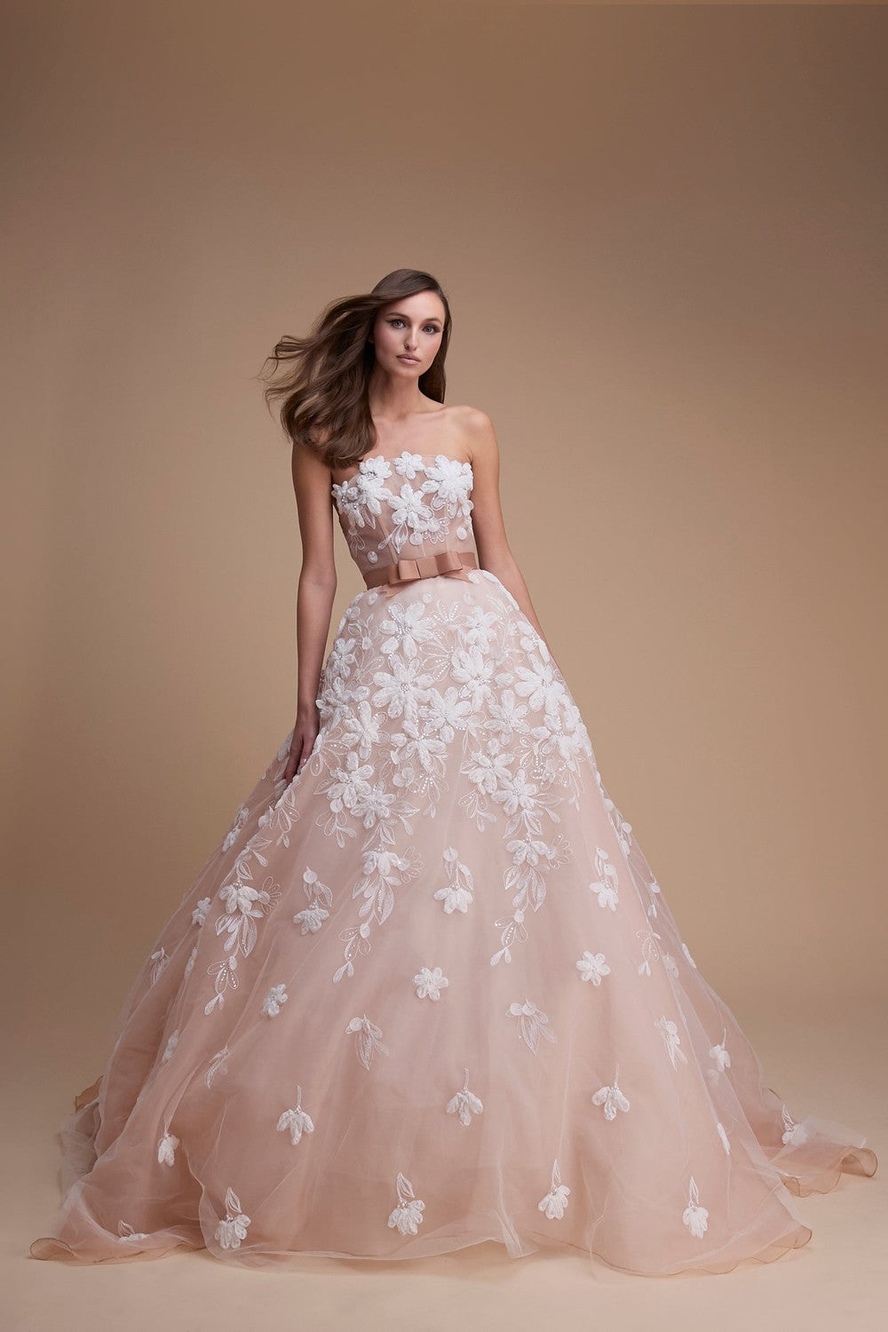 Modern And Romantic Strapless Floral Ball Gown With Bow by Jaclyn Whyte — image 1 of 2