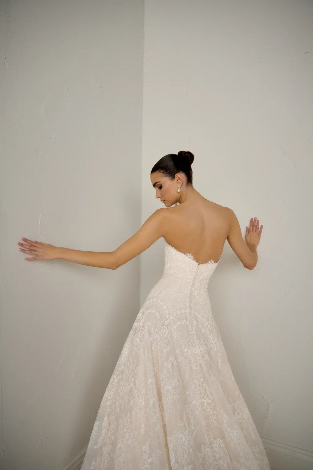 Chic And Romantic Strapless Lace Modified A-Line Wedding Dress by Justin Alexander — image 2 of 3