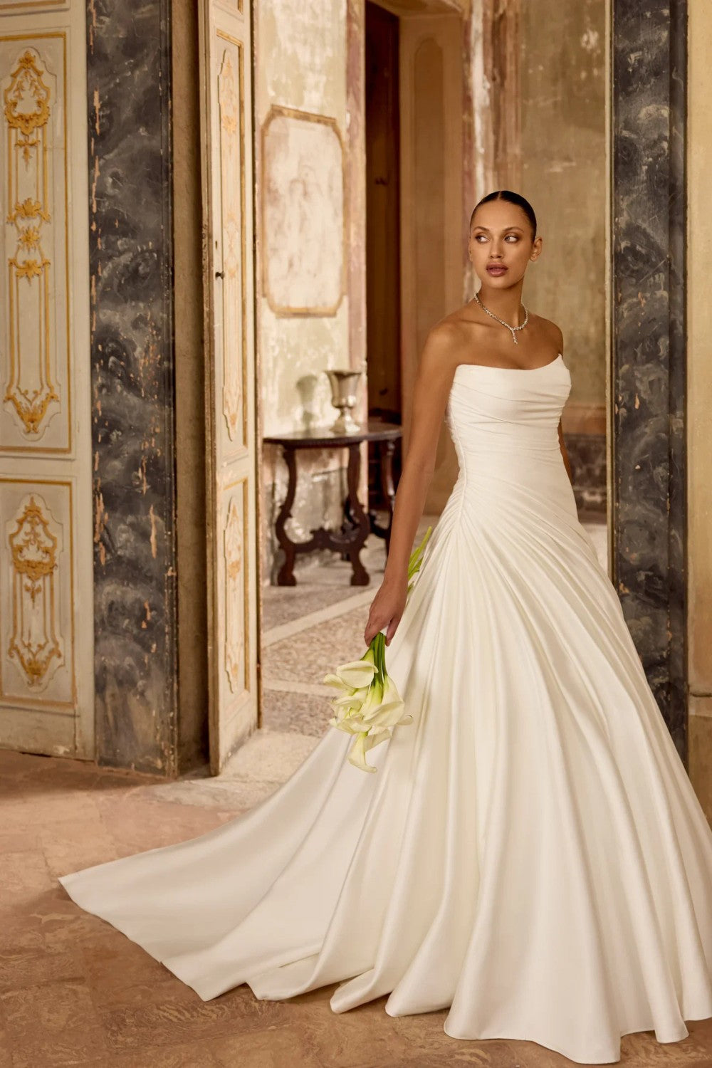 Sleek A-line Wedding Dress With Structured Draping by Justin Alexander — image 1 of 4