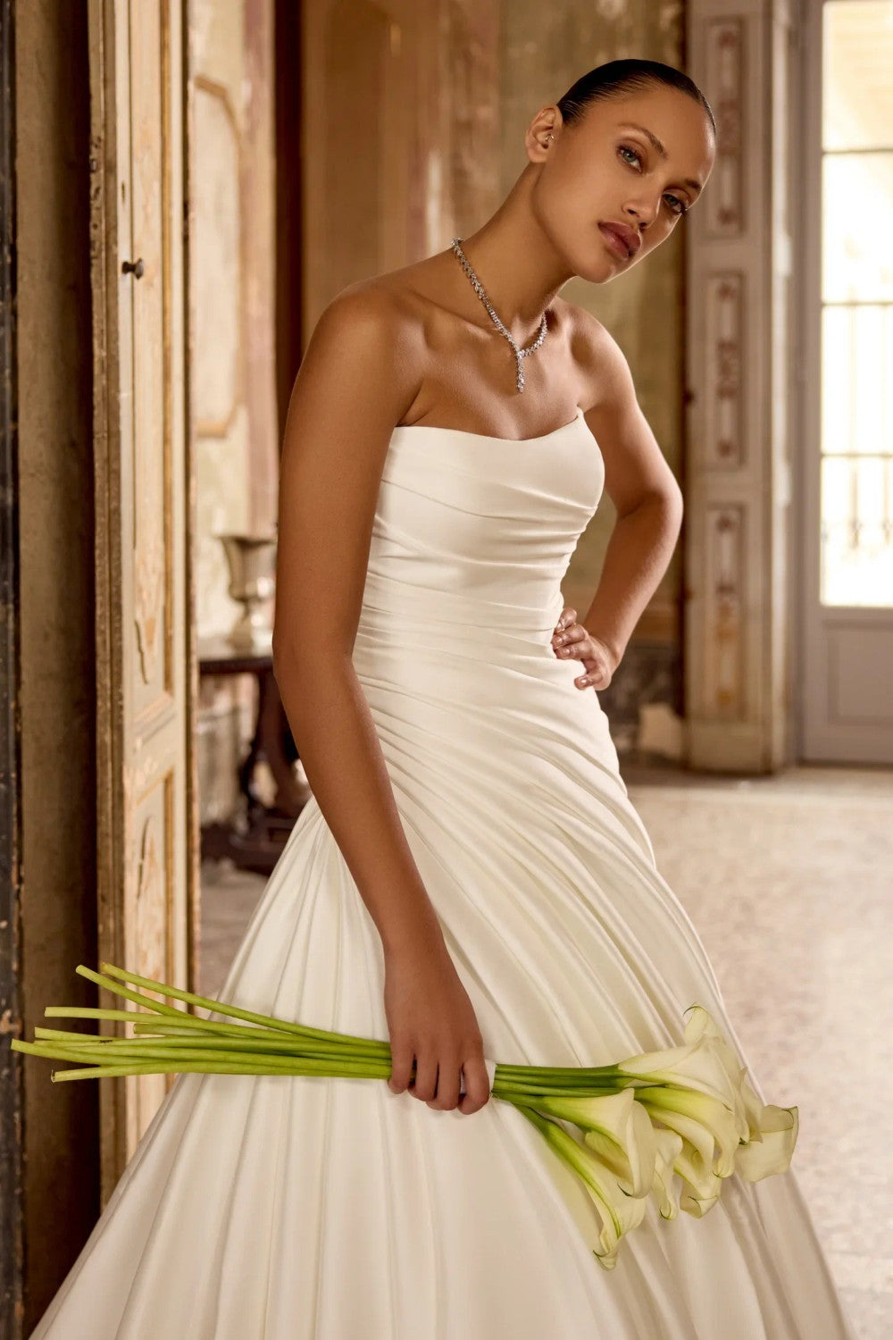 Sleek A-line Wedding Dress With Structured Draping by Justin Alexander — image 2 of 4