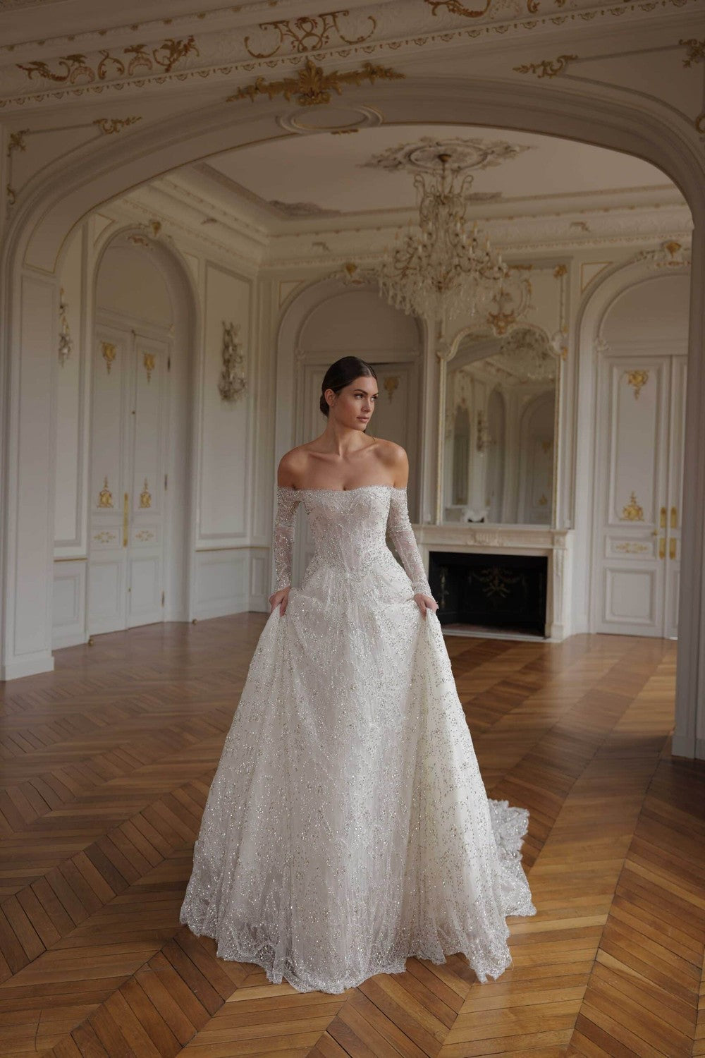Regal Crystal-Embellished Lace Ball Gown With Off-The-Shoulder Long Sleeves by Lee Petra Grebenau — image 1 of 3
