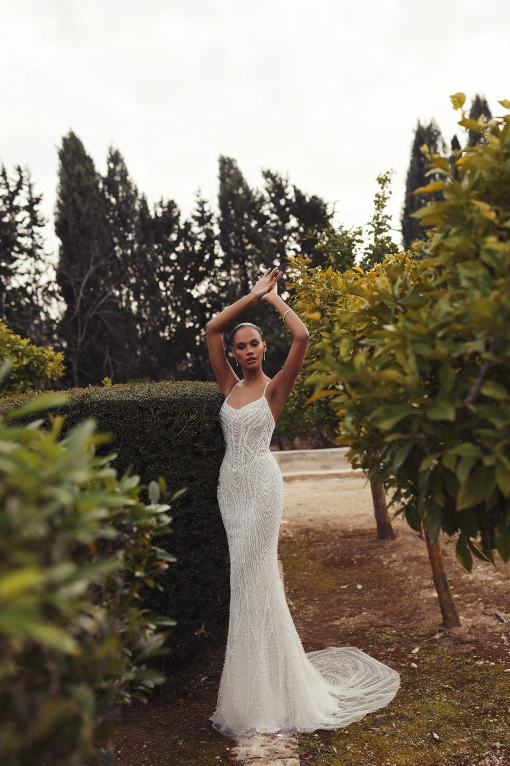 Glamorous Pearl-Embellished Sheath Wedding Dress by Love by Pnina Tornai — image 1 of 3