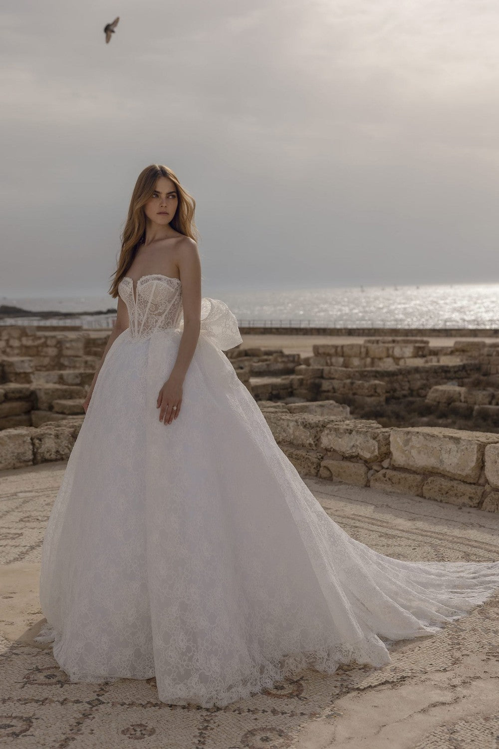 Lace Strapless Ball Gown Wedding Dress With Bow by Love by Pnina Tornai — image 1 of 2