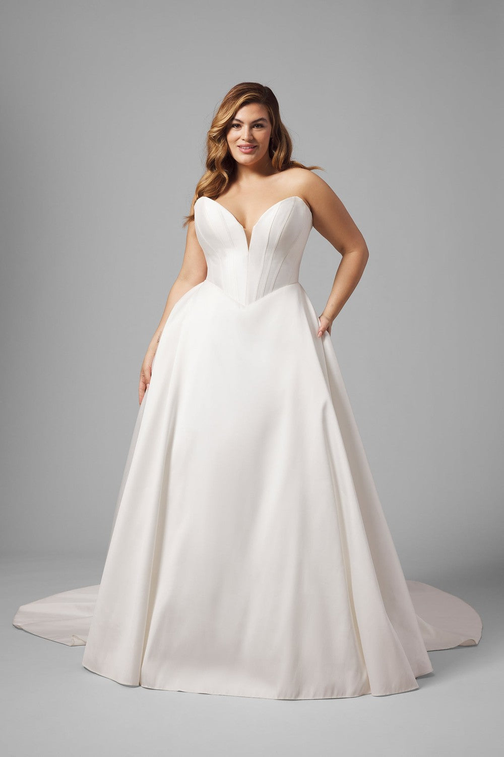 Plus-Size Simple Strapless Basque-Waist Ball Gown by Love by Pnina Tornai — image 1 of 3