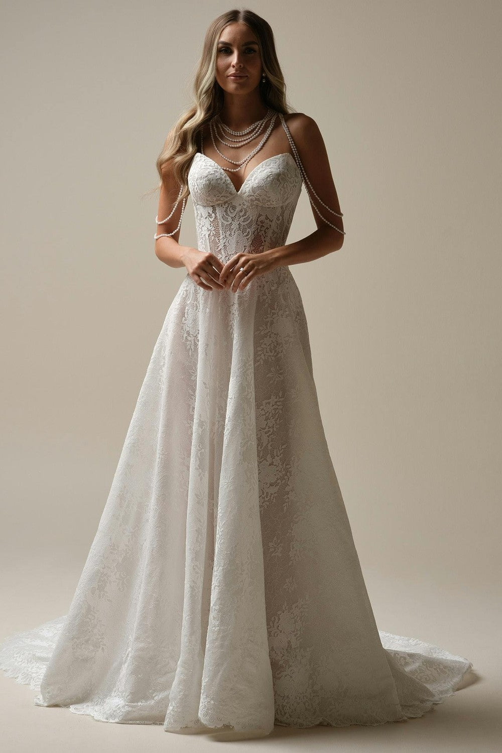 Delicate Lace A-Line Wedding Dress With Detachable Sleeves by Maggie Sottero — image 1 of 4