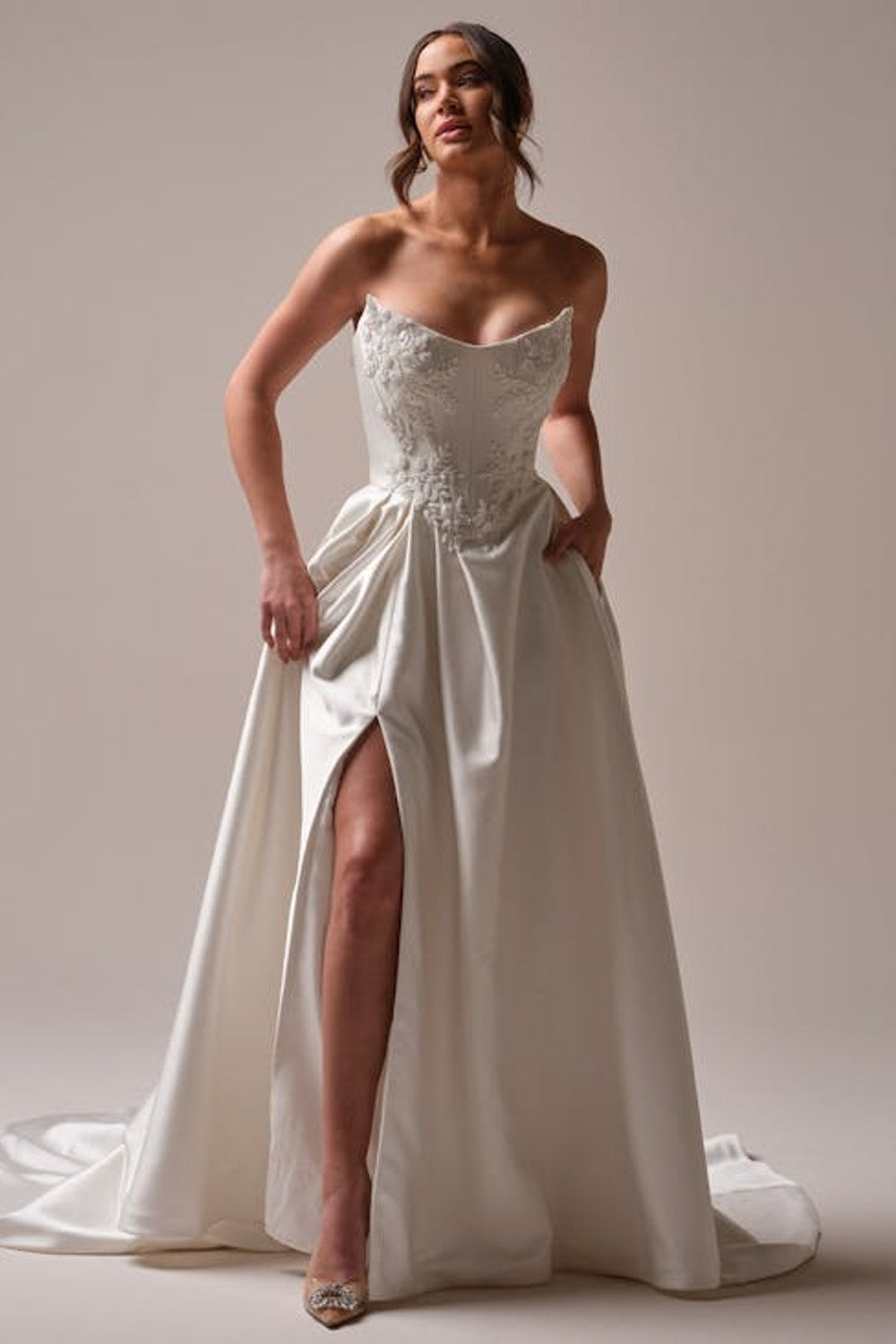 Modern And Elegant Embellished Satin A-Line Wedding Dress With Detachable Accessories by Maggie Sottero — image 1 of 5