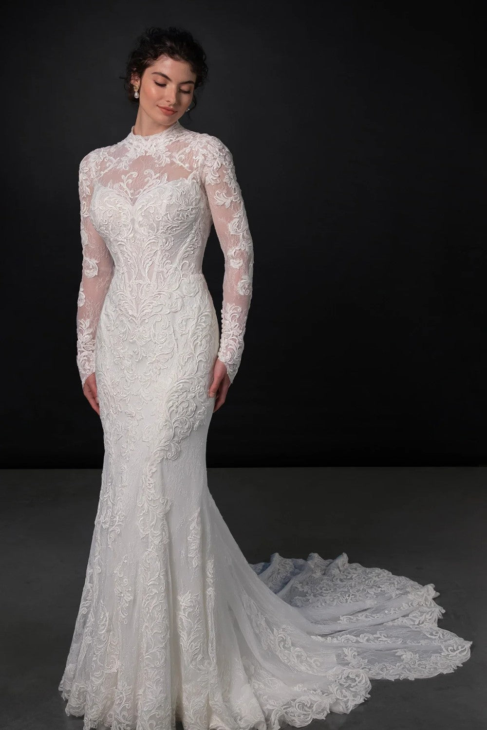 High-Neck Long Sleeve Lace Fit-And-Flare Wedding Dress With Detachable Overskirt by Martina Liana — image 1 of 5