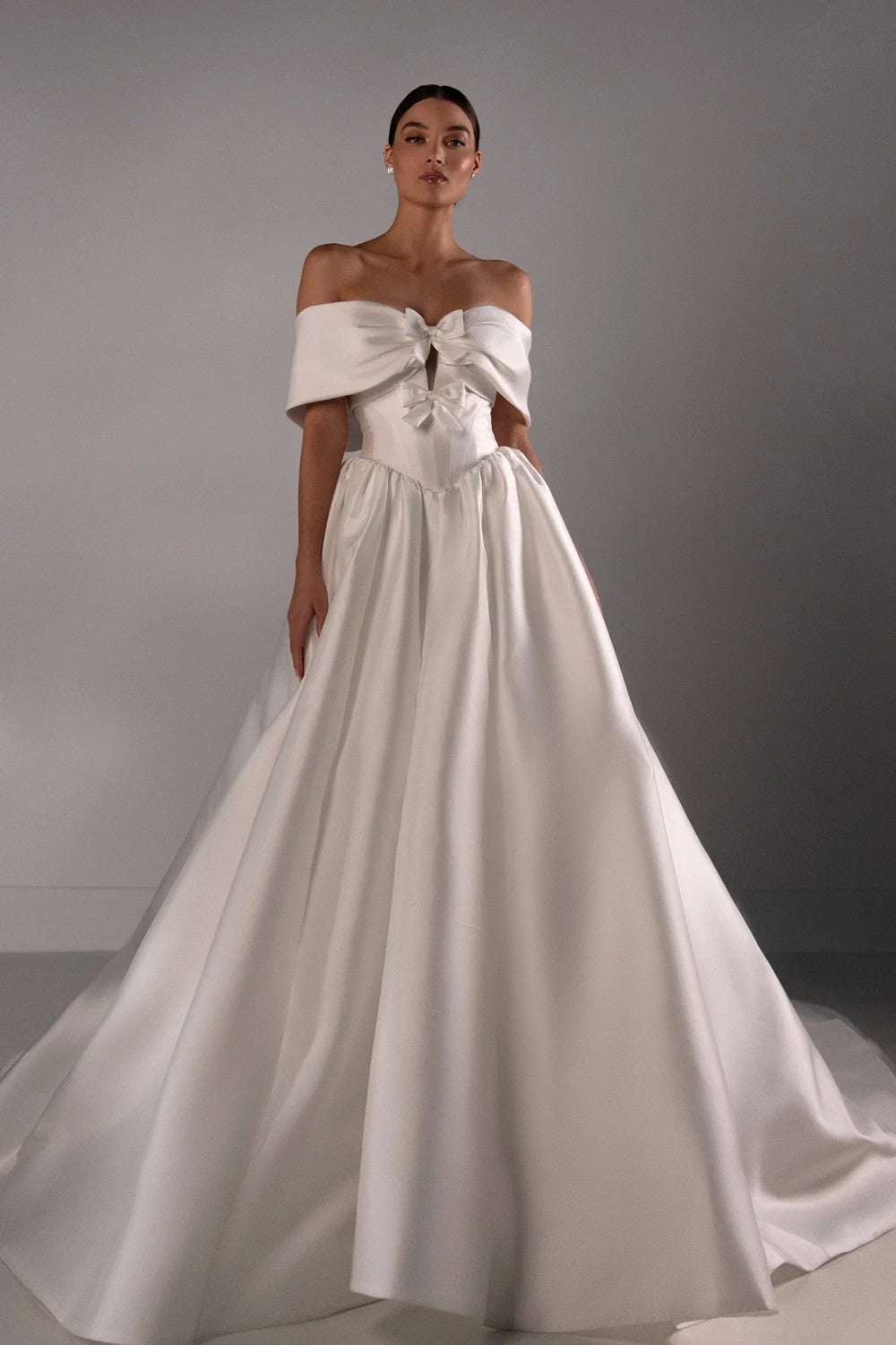 Chic And Classic Off-The-Shoulder Silk Ball Gown With Bows by Martina Liana Luxe — image 1 of 3
