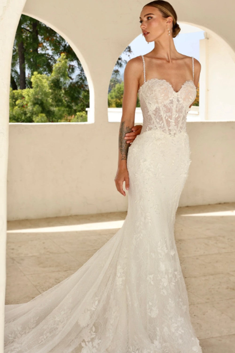 Pearl-Embellished Lace Fit-and-Flare Wedding Dress With Buttons by Martina Liana