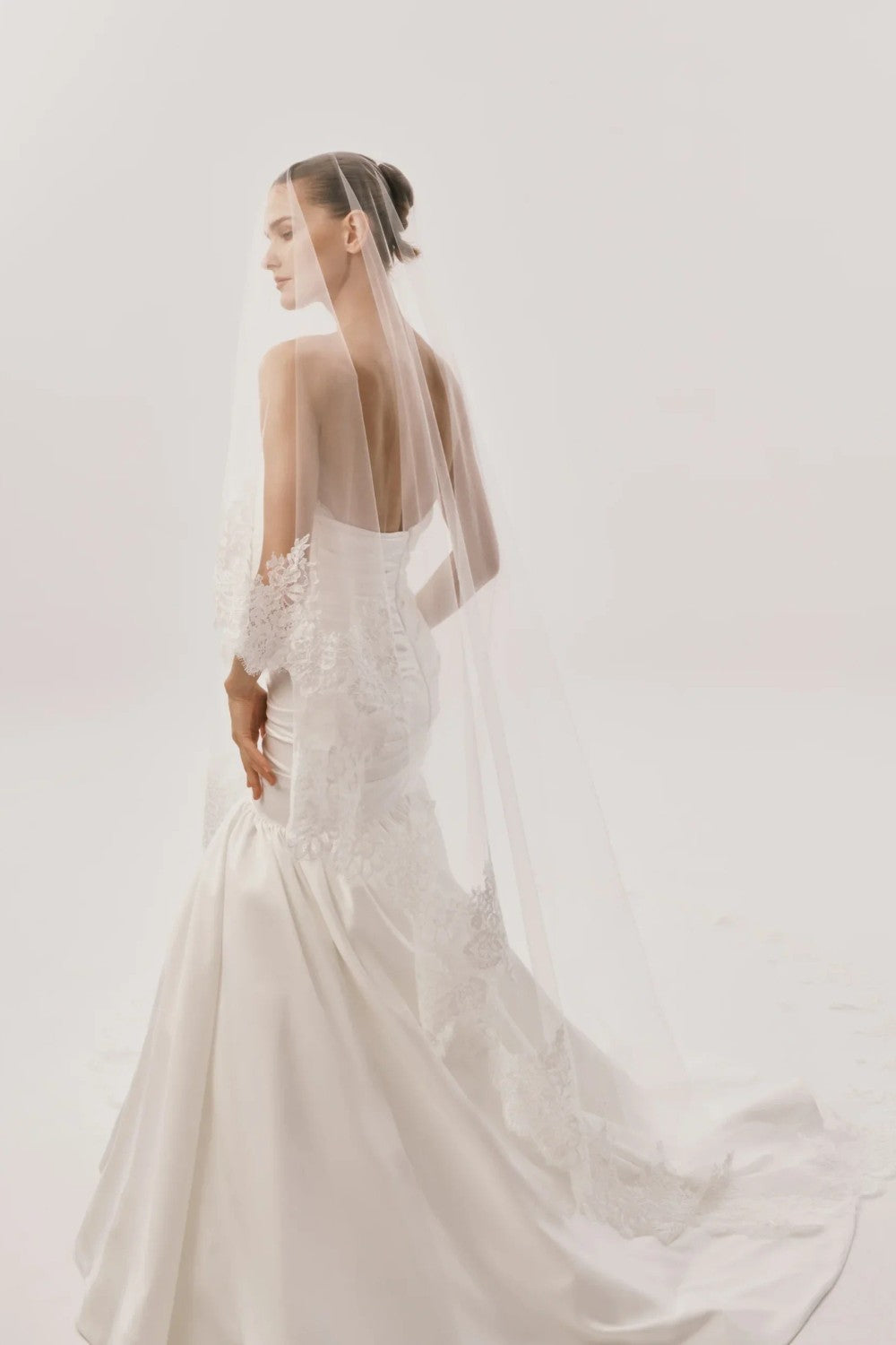 Chic And Dramatic Mermaid Wedding Dress by Nicole + Felicia For Kleinfeld — image 3 of 3