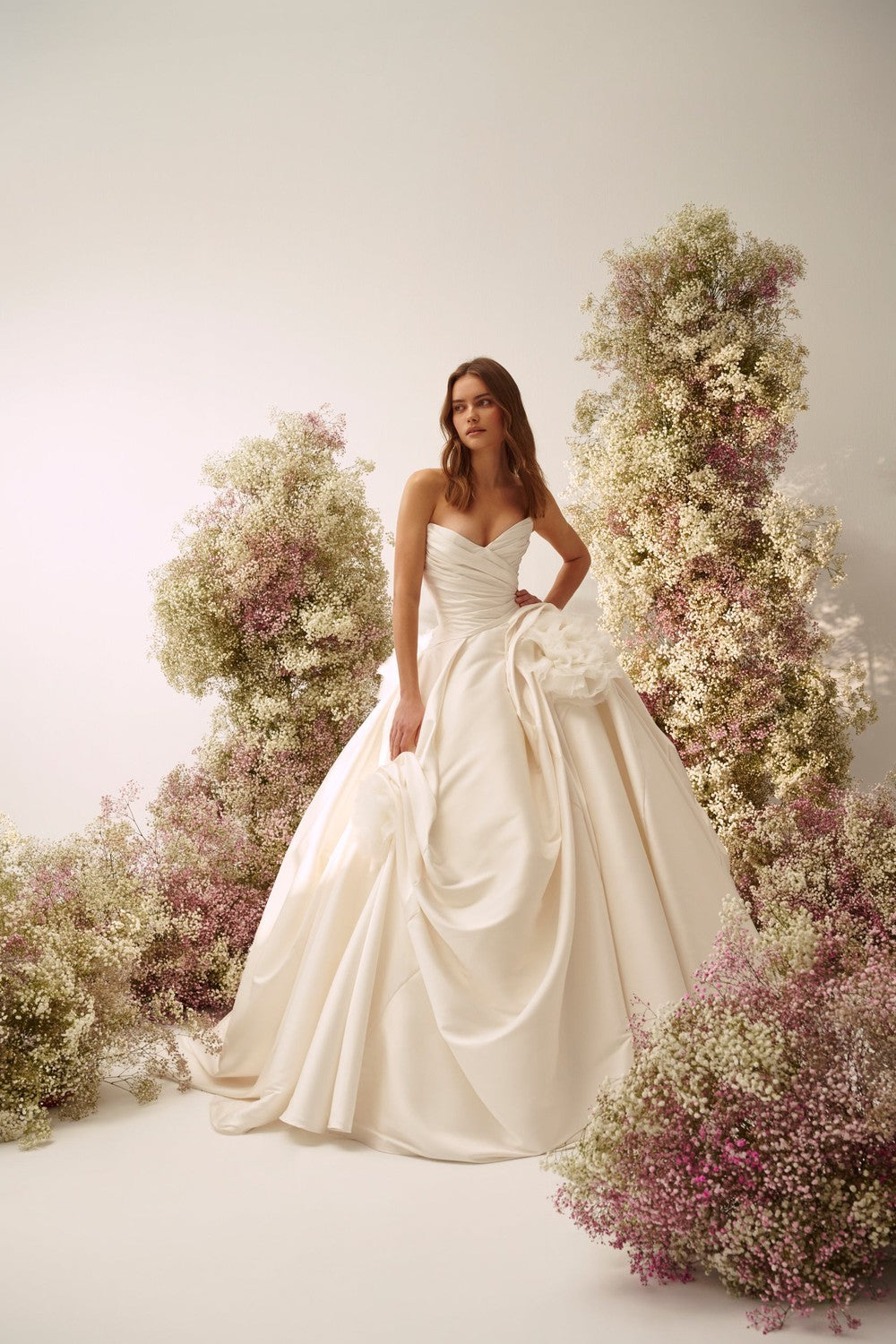 Chic And Dramatic Structural Ball Gown With Rosettes by Nicole + Felicia — image 1 of 2