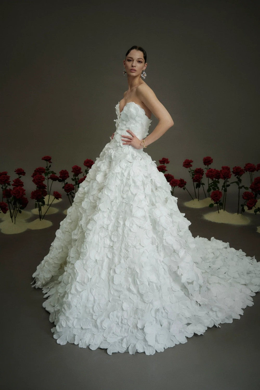 Dramatic And Romantic Hand-Cut 3D Floral Ball Gown by Nicole + Felicia — image 1 of 4