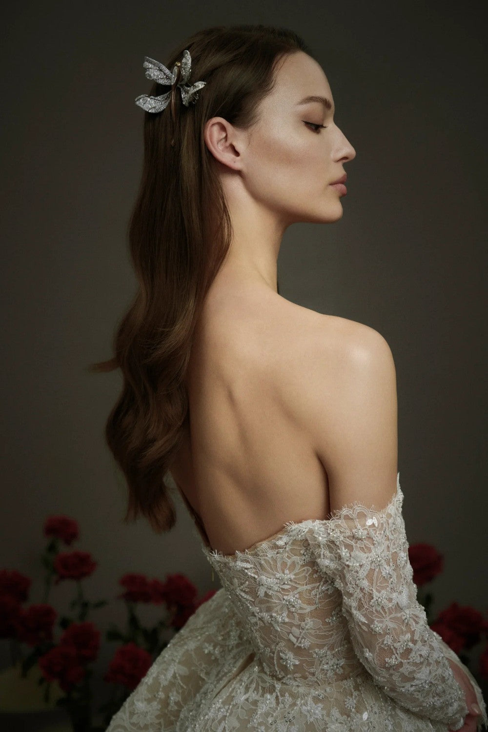 Elegant Embellished Lace Off-The-Shoulder Long Sleeve Ball Gown by Nicole + Felicia — image 2 of 3