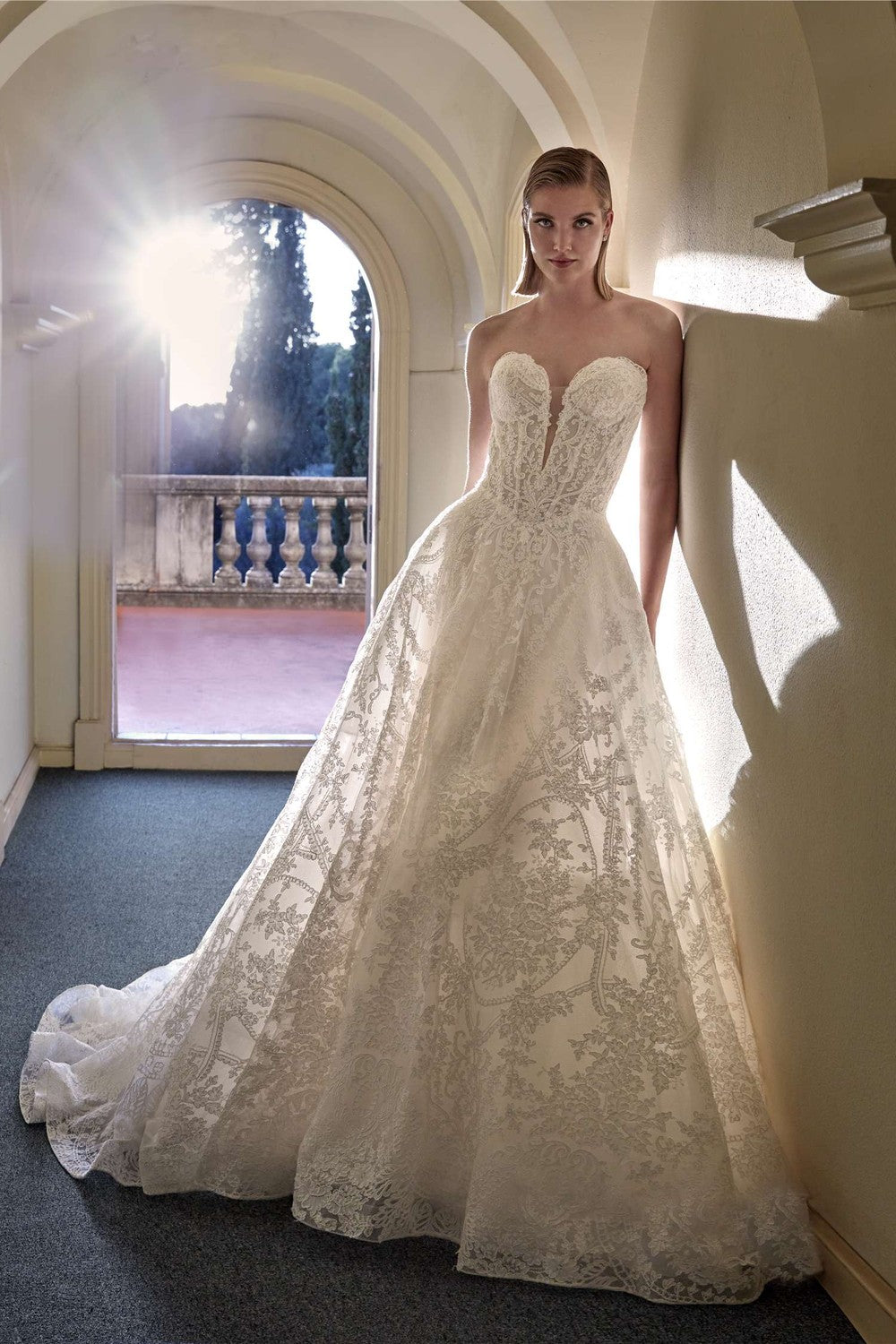 Romantic Basque-Waist Lace A-Line Wedding Dress by Pronovias — image 1 of 2