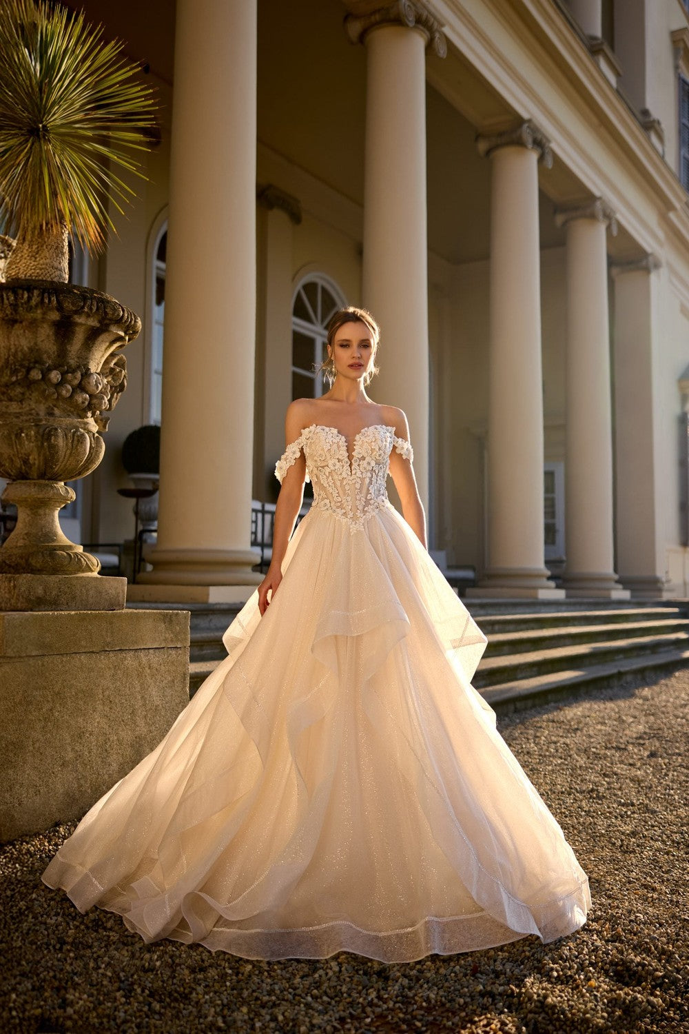 Dramatic And Romantic Sparkly Tiered Ball Gown With 3D Florals by Randy Fenoli — image 1 of 2