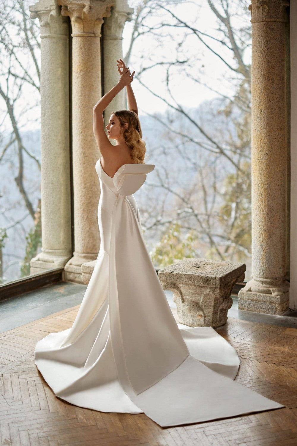 Simple and Modern Strapless Fit-and-Flare Wedding Dress With Bow by Randy Fenoli — image 2 of 2