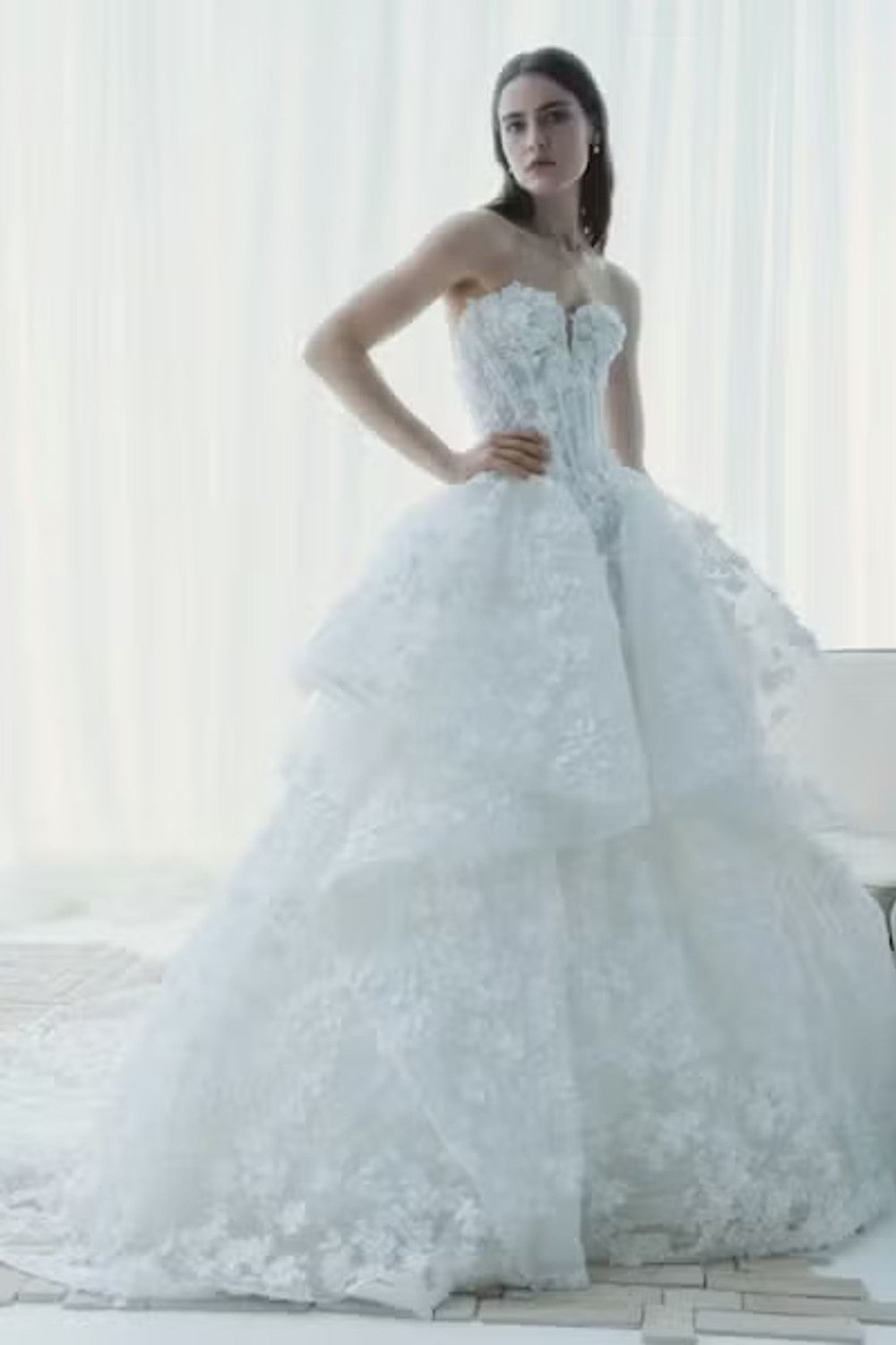 Modern Floral Ball Gown With Peplum Layers by Rivini — image 1 of 2