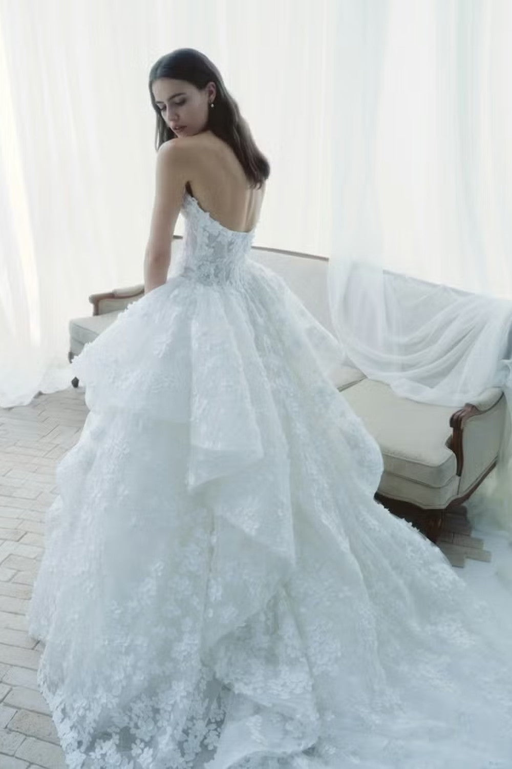 Modern Floral Ball Gown With Peplum Layers by Rivini — image 2 of 2