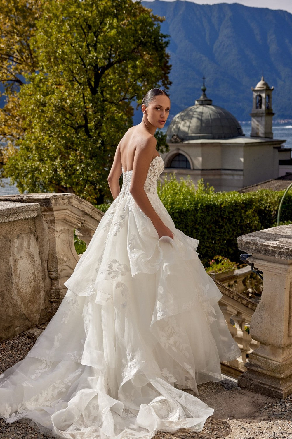Romantic and Dramatic Tiered Ball Gown With Buttons by Justin Alexander — image 3 of 4