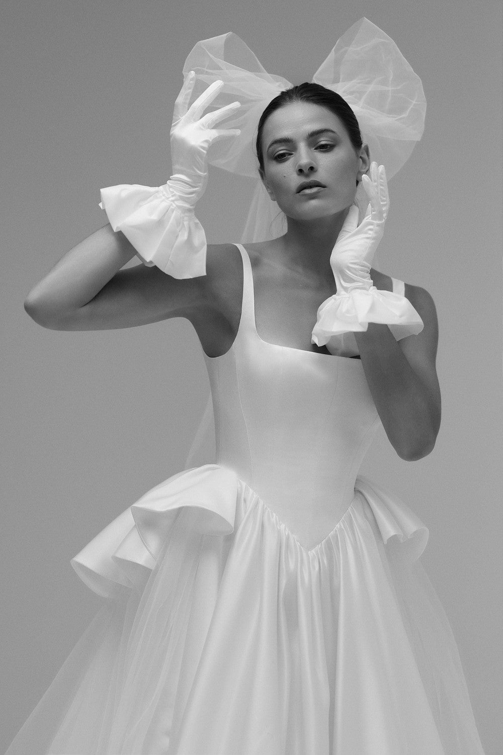 Chic And Architectural Square-Neck Ball Gown With Peplum by Tal Kedem Bridal Couture — image 1 of 4