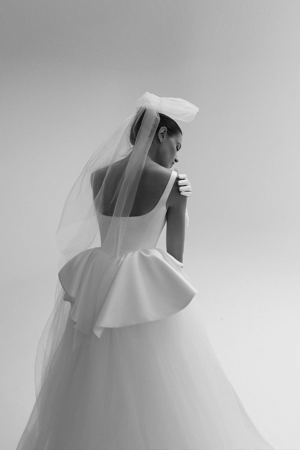 Chic And Architectural Square-Neck Ball Gown With Peplum by Tal Kedem Bridal Couture — image 2 of 4
