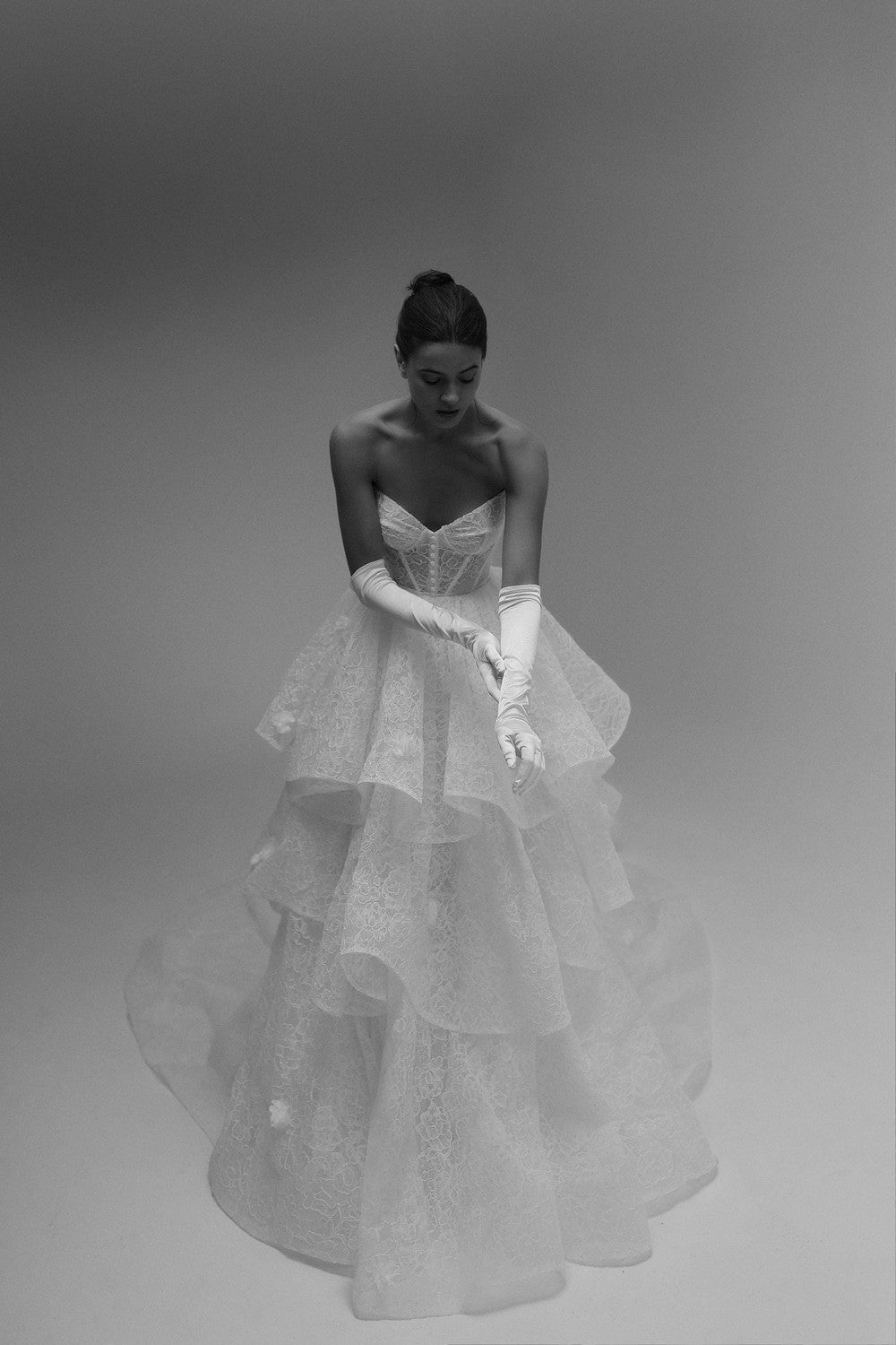 Feminine And Whimsical Lace Tiered Ball Gown by Tal Kedem Bridal Couture — image 2 of 4