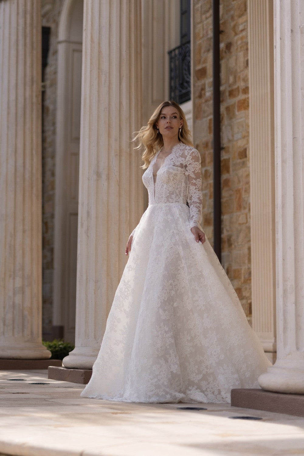 Timeless Long Sleeve Lace A-Line Wedding Dress With Buttons by Verdin Bridal — image 1 of 2