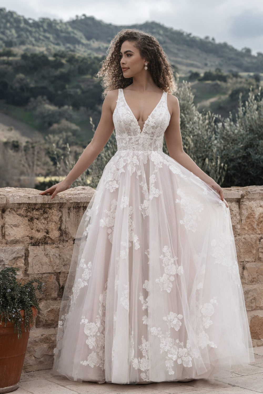 The Quiet Drama of V-Back Bridal Style