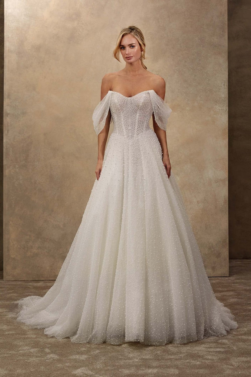 Modern Romance in Demetrios Open Back Gowns