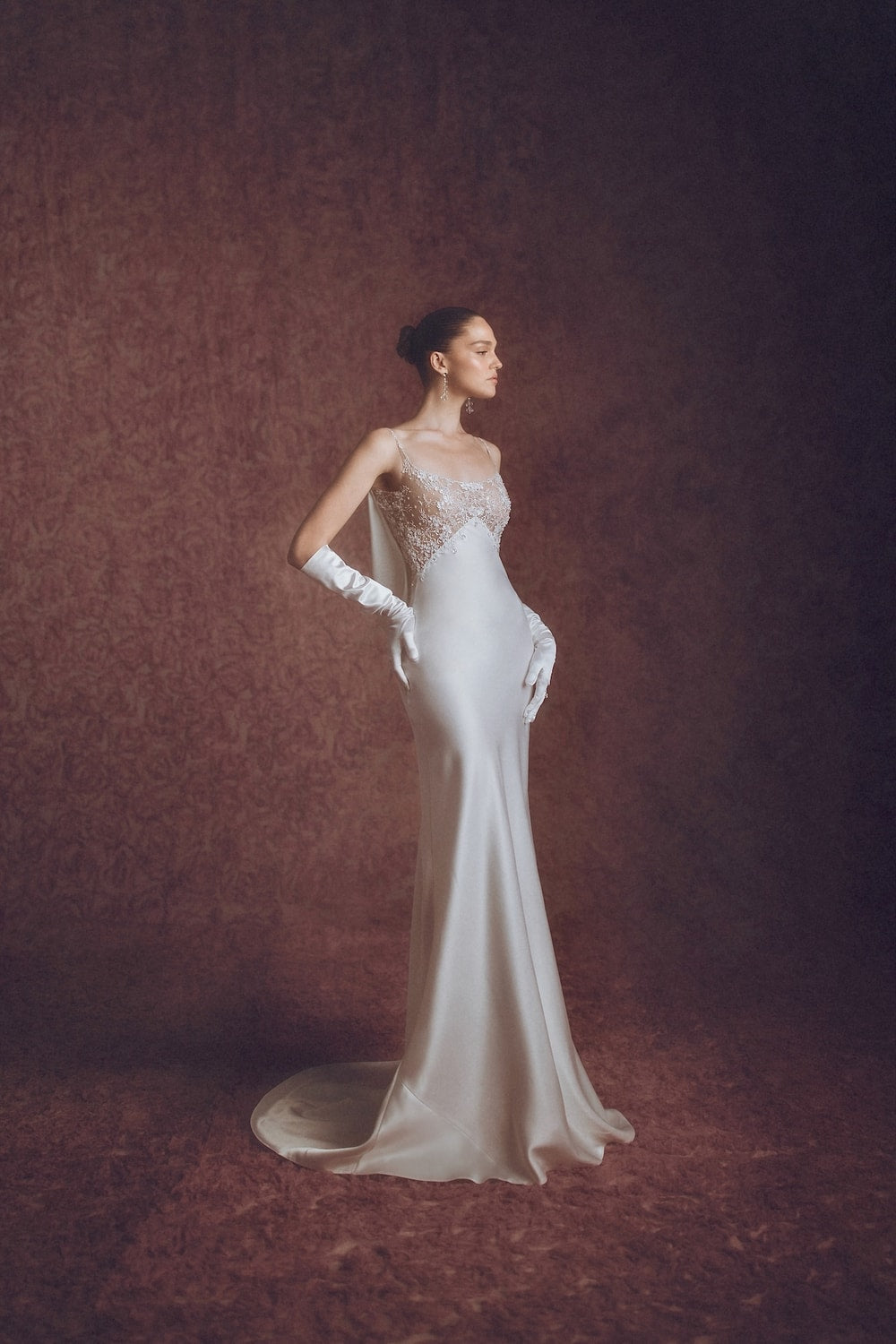Chic and Modern Sheath Wedding Dress with Dramatic Open Back by Pnina Tornai — image 1 of 2