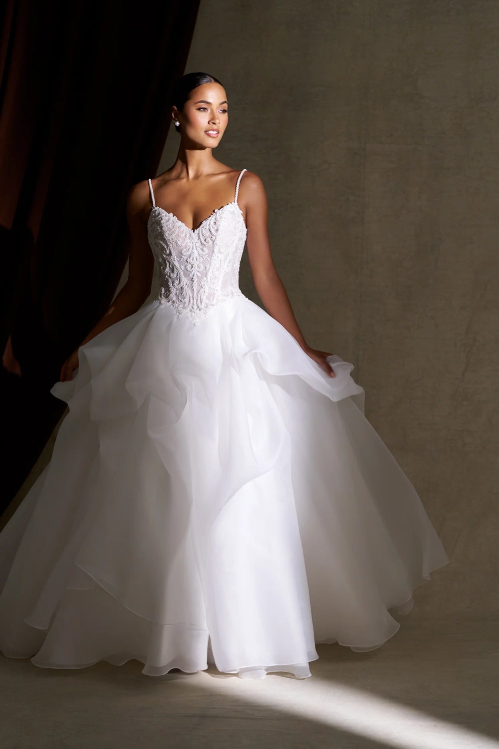 Voluminous Ball Gown with Flowing Skirt and Soft Pickups by Allure Bridals — image 1 of 4
